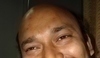 Fotografie zachycující mužskou tvář a smějící se oči