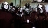 Hudební kapela Slipknot s bizarními kostýmy a maskami