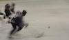 Snímek zobrazující hokejisty na ledu