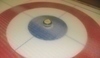 Snímek zobrazující hru Curling