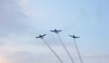 Fotografie tří letadel ve vzduchu