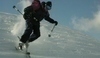 Snímek lyžaře na sjezdovce