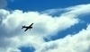 Fotografie letadla ve vzduchu
