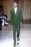 Muž v zeleném obleku